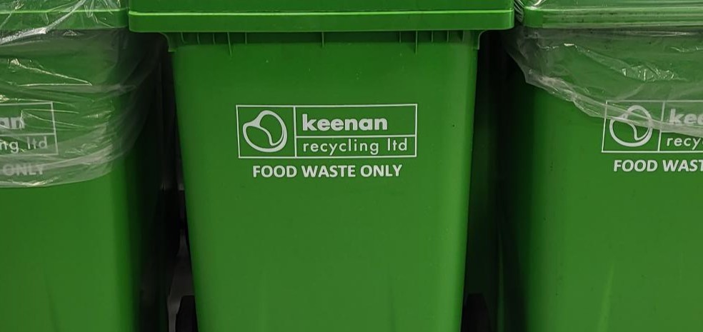 picture of green bins saying Food Waste Only
